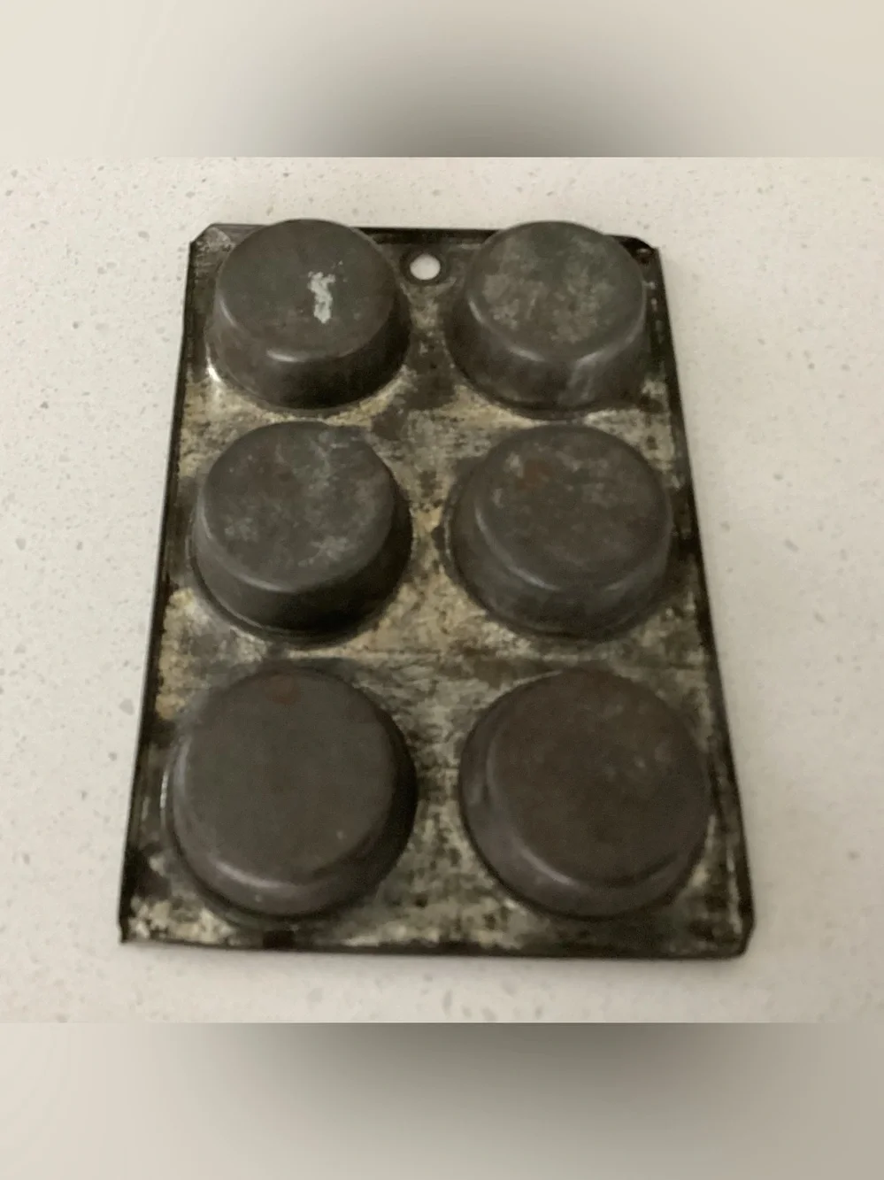 Vtg. Children’s toy muffin tin or miniature salesmen sample. Hole to hang